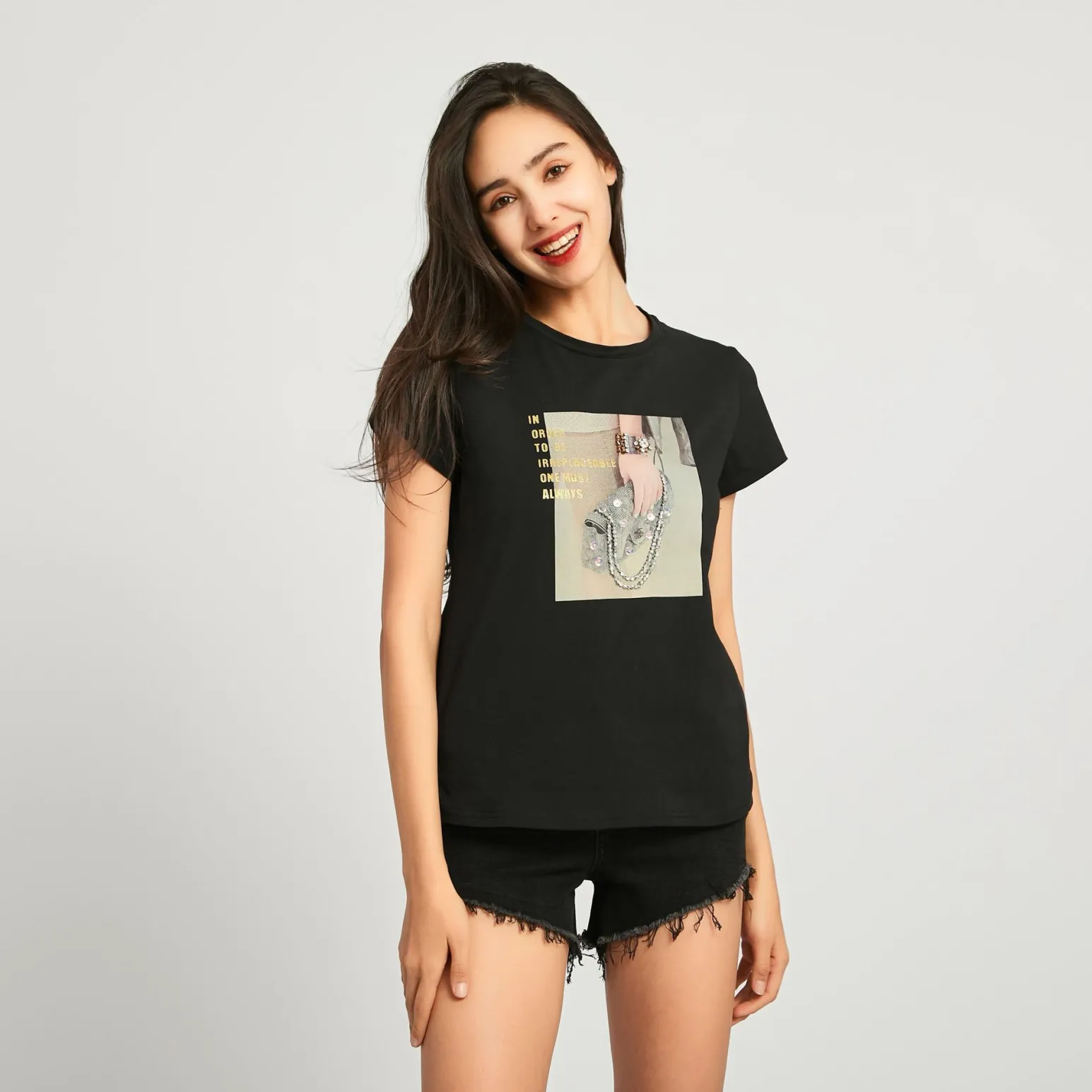 BACHATA - TSHIRT MANICA CORTA NERA CON STAMPA BORSETTA