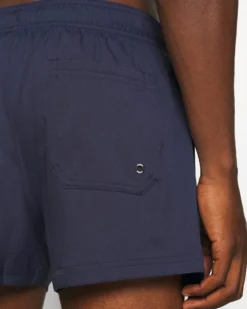 PUMA - Costume da bagno pantaloncino corto blu scuro con logo bianco