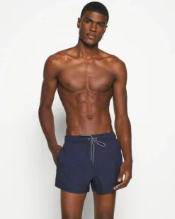 PUMA - Costume da bagno pantaloncino corto blu scuro con logo bianco