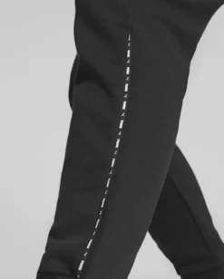 PUMA - Pantalone da donna nero con Stampa logo laterale