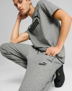 PUMA - PANTALONE ESSENTIAL N. 1 LOGO SLIM FL GRIGIO  DA UOMO,  682642-03