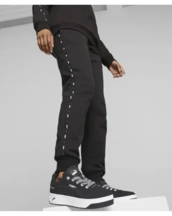 PUMA - Pantalone tuta da donna nero con banda logo laterale
