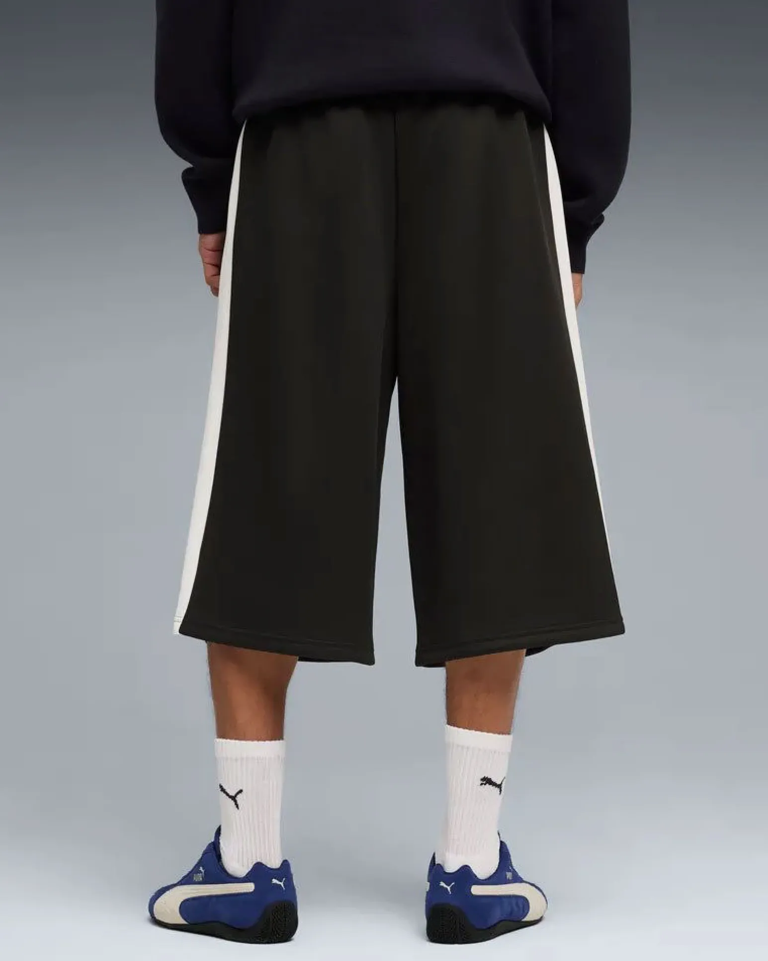 PUMA - PANTALONE TUTA 3/4 NERO CON BANDE BIANCHE T7 RELAXED - DA UOMO, 635359-01