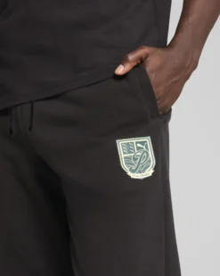PUMA - PANTALONE TUTA NERO SPORTS LEGACY GRAPHIC DA UOMO, 629631-01
