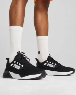 PUMA RETALIATE 3 - Scarpa nera con logo bianco