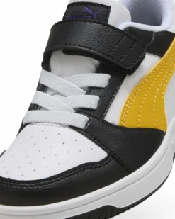 PUMA -  SNEAKERS KIDS REBOUND V6 LO BIANCA CON DETTAGLI NERI E GIALLI DAL 28 AL 35,  397419-23