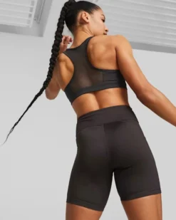 PUMA - Top nero in tessuto traspirante con logo nero