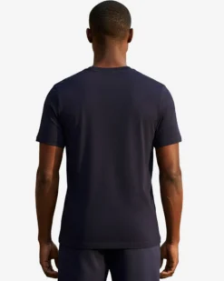 PUMA - T-SHIRT BLU  ESSENTIAL SMALL GRAPHIC TEE  DA UOMO, 694935-16