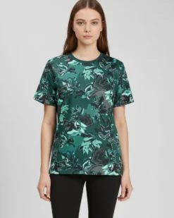 PUMA - T-SHIRT MEZZA MANICA VERDE FLOWER AOP RELAXED TEE  DA DONNA - 693300-75
