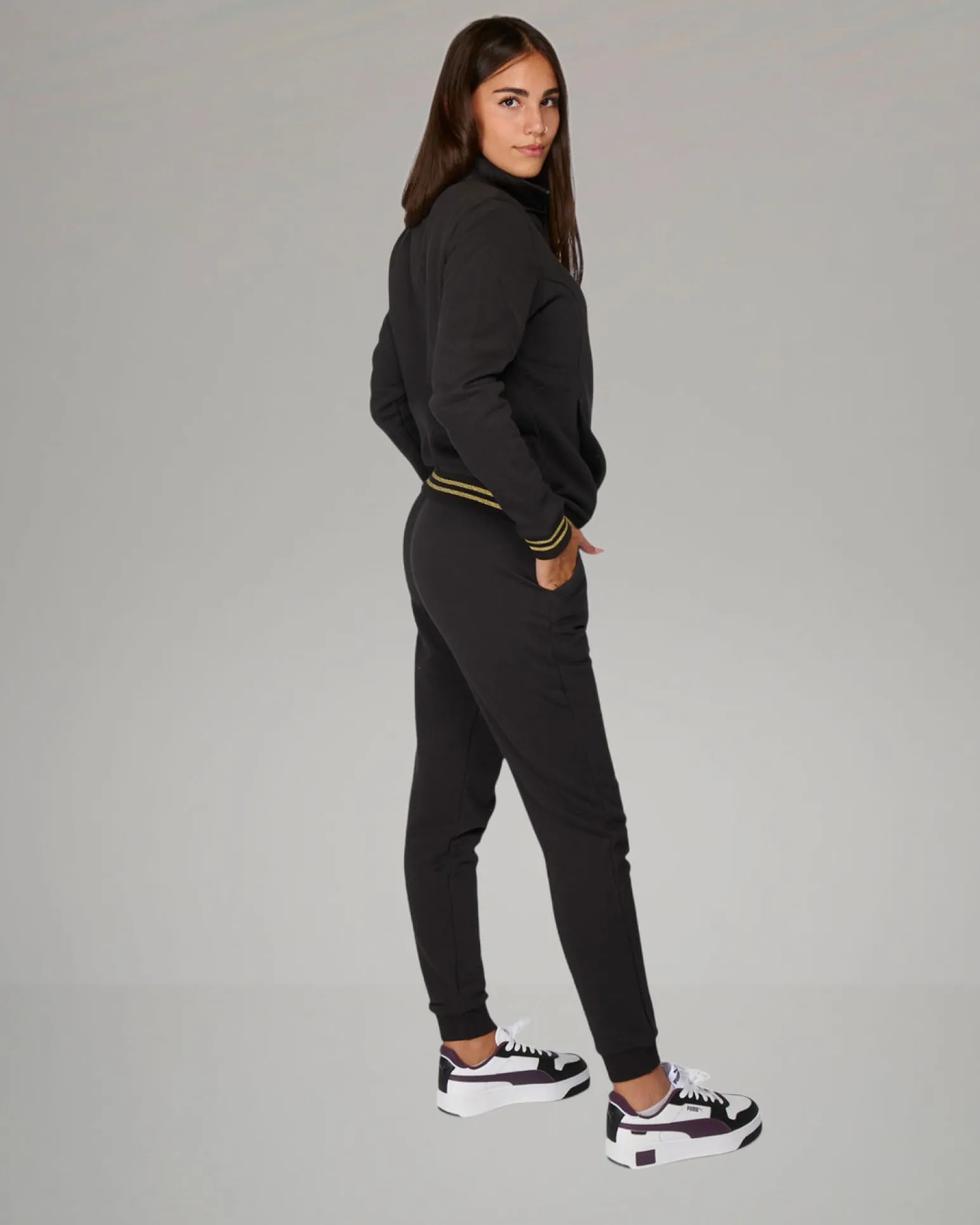 PUMA - TUTA COMPLETA NERA ESSENTIAL+ GLITTER FZ SUIT FL DA DONNA , 684764-01