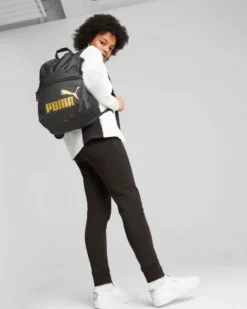PUMA - Zaino nero e oro con tasca laterale e spallacci imbottiti regolabili