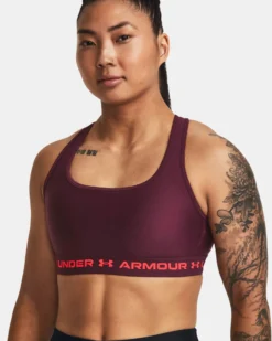 UNDER ARMOUR - Top bordeaux ultra aderente in tessuto traspirante con banda logo rosa